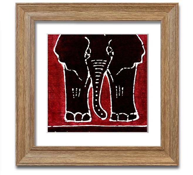 A vibrant Aboriginal Red Elephant framed print showcasing intricate designs and colors, ready to hang on a wall.